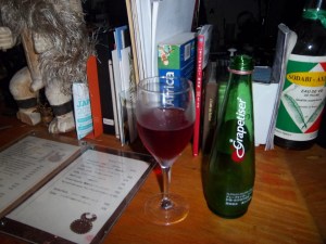 Drinking grapetizer at Tribes